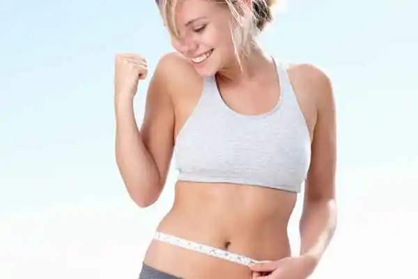 woman happy after fat reduction treatment Avon