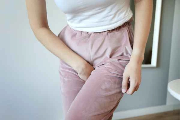 woman struggling with urine incontinence Avon